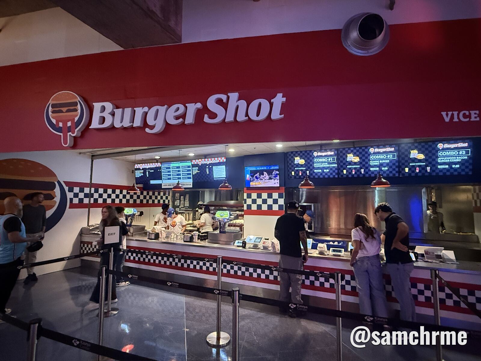 Burger Shot-branded food counter inside the Kaseya Center, photographed during an October 21 game.