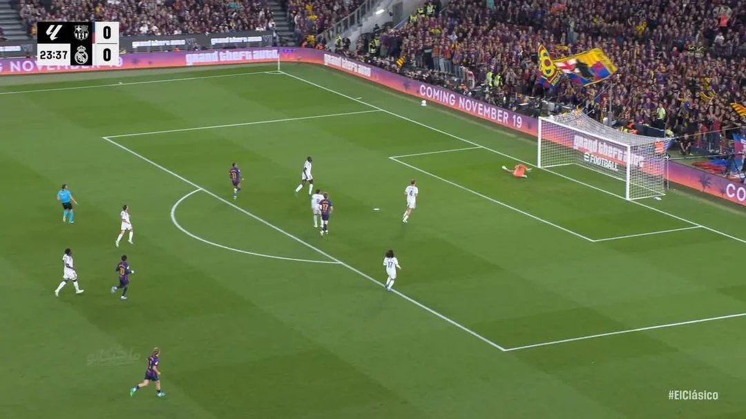 A photographed football broadcast shows GTA VI advertising beside the pitch during Barcelona versus Real Madrid.