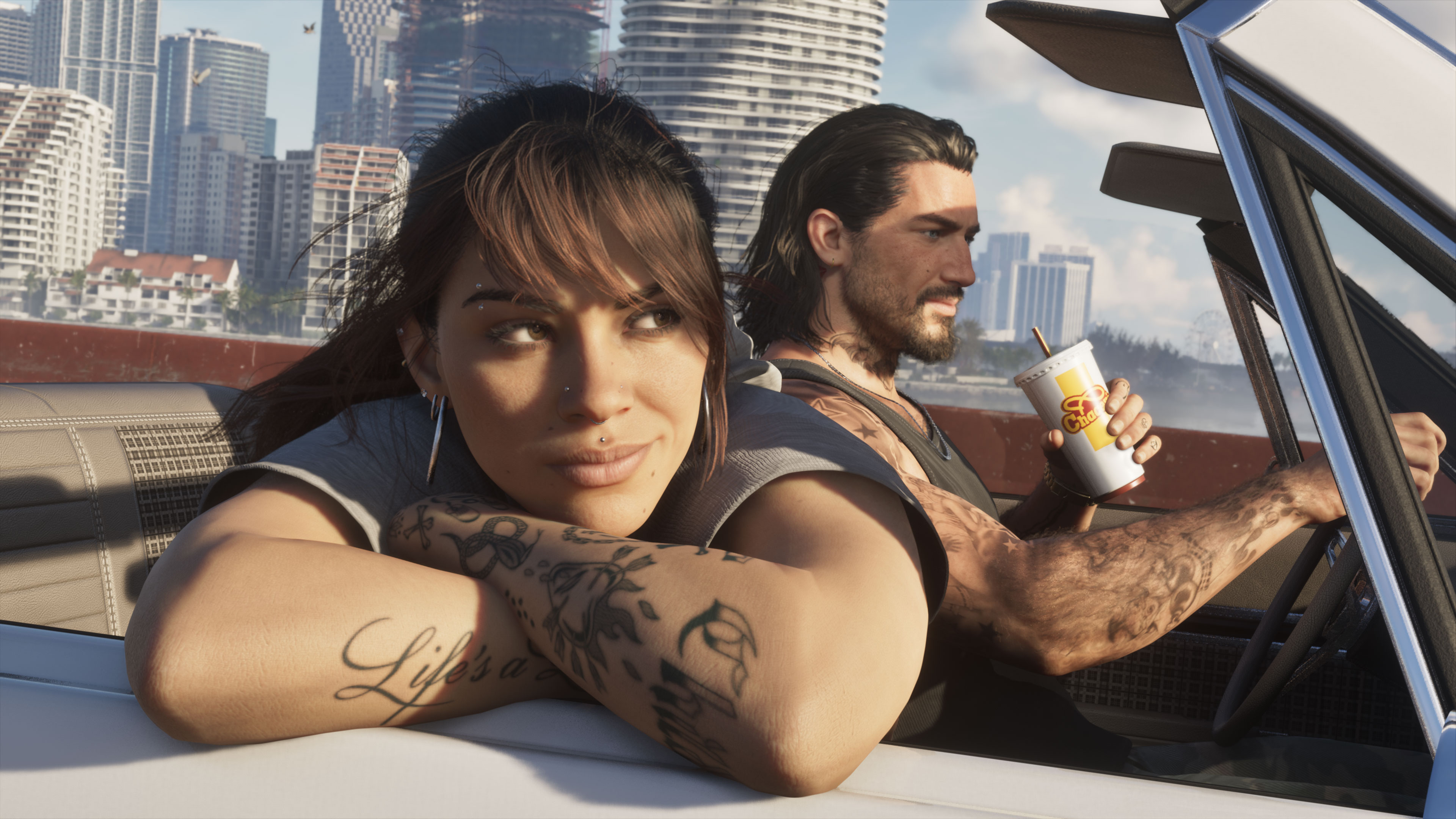 Lucia leaning on a convertible door beside Jason with Vice City towers behind them